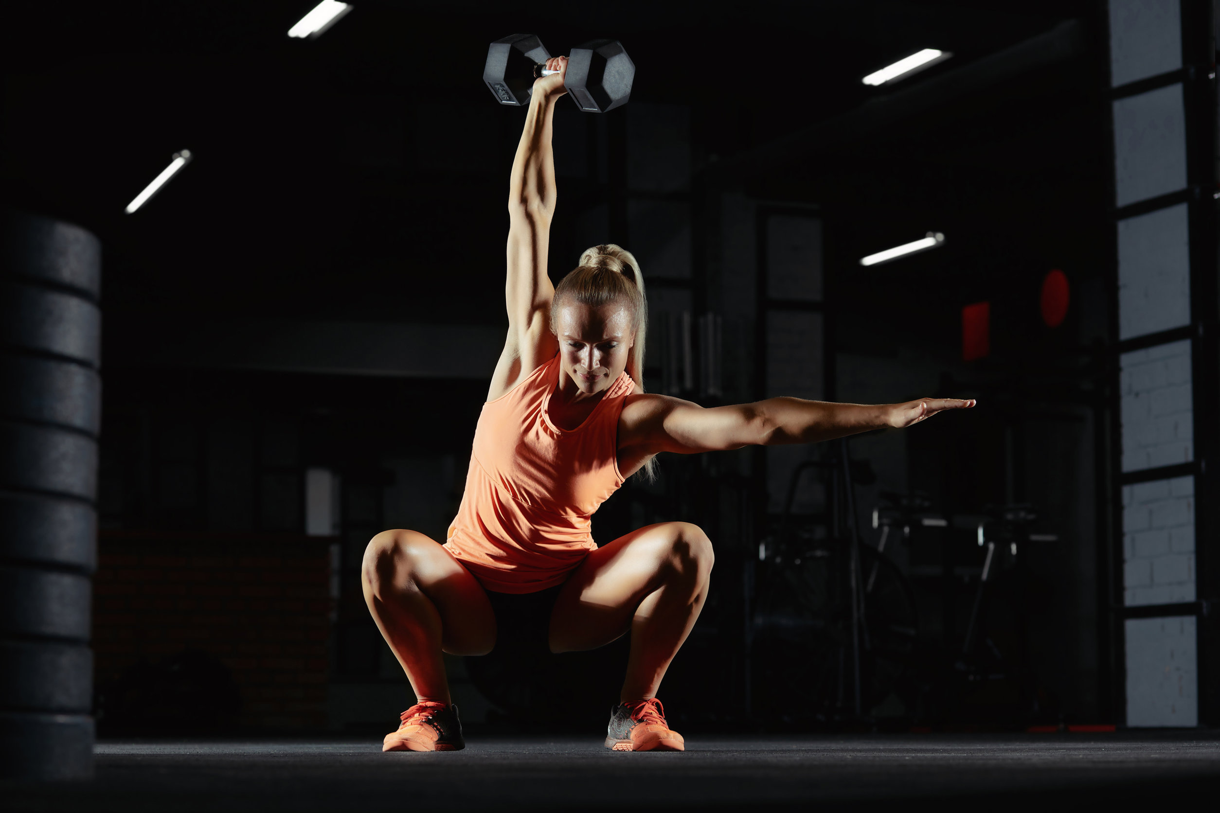 Female crossfit athlete exercising